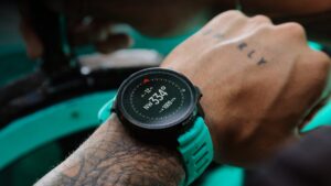 Close up of a hand wearing a digital watch